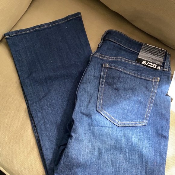 GAP Denim - NWT GAP women’s, medium wash, skinny boot jeans, never worn.